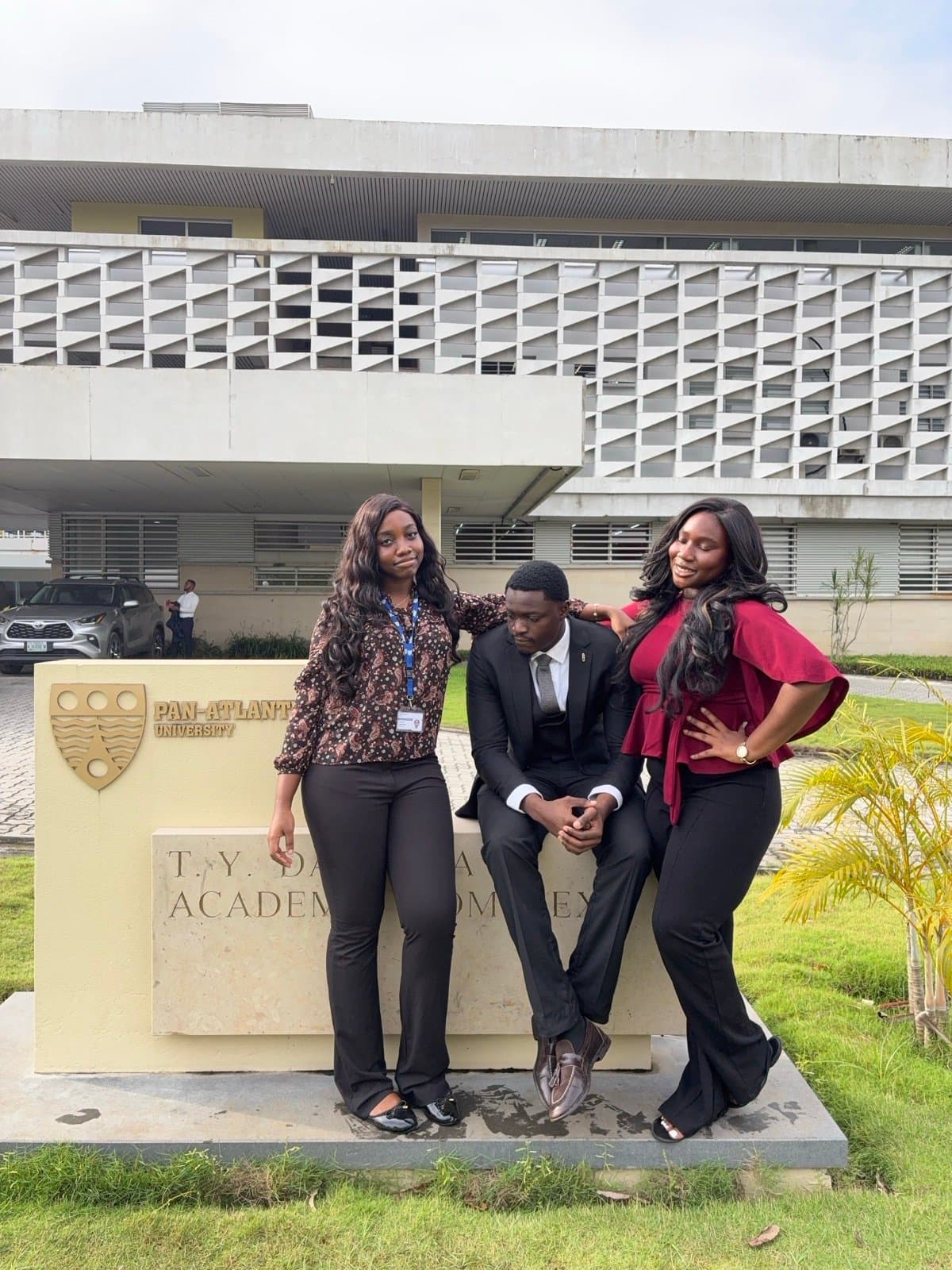 Celebrating project defense day with classmates at Pan-Atlantic University